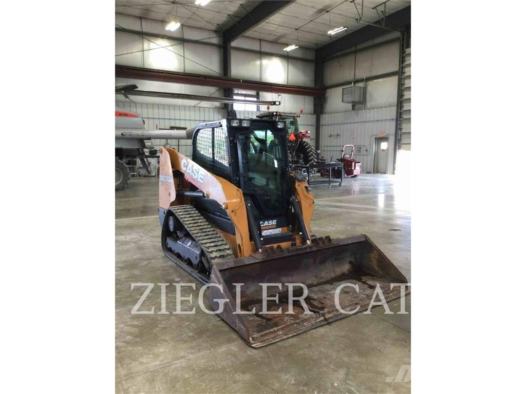 New Holland TR270B Rupsladers