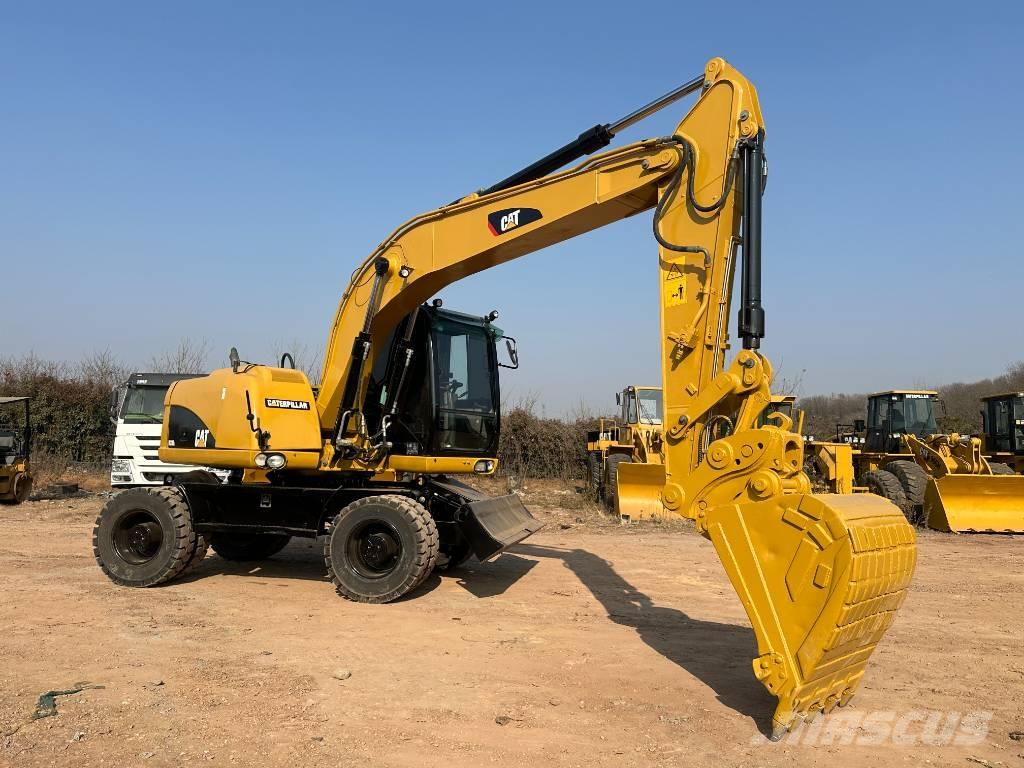 CAT M 320D Wielgraafmachines