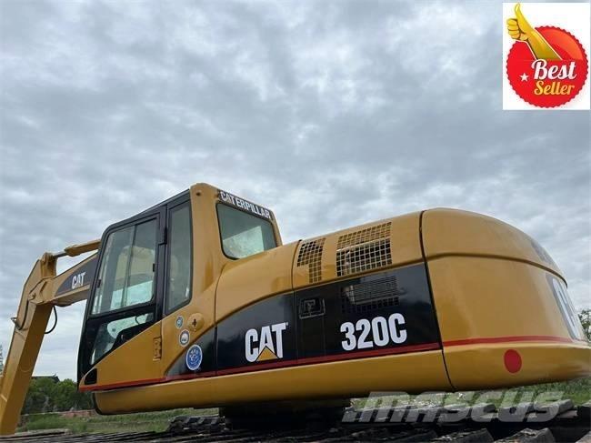 CAT 320 C Amfibische graafmachines