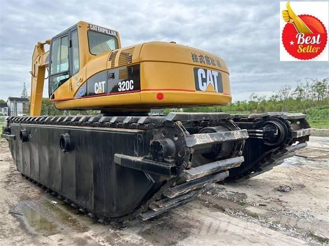 CAT 320 C Amfibische graafmachines