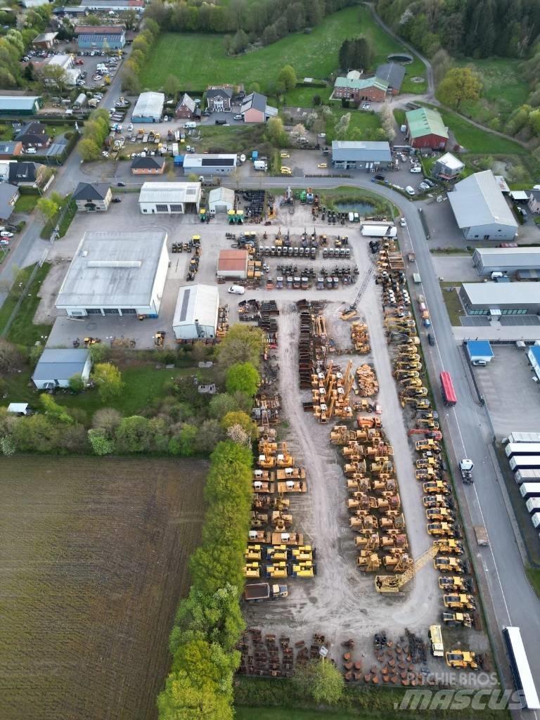 CAT M 318 D Wielgraafmachines