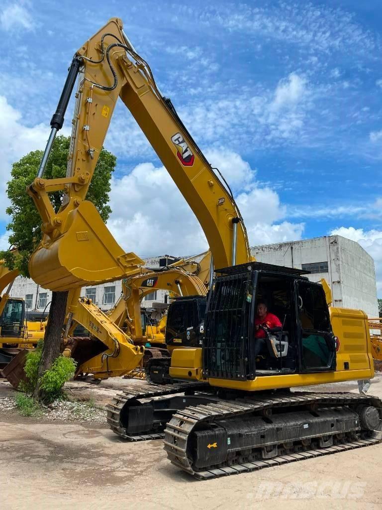 CAT 323 Midigraafmachines 7t - 12t