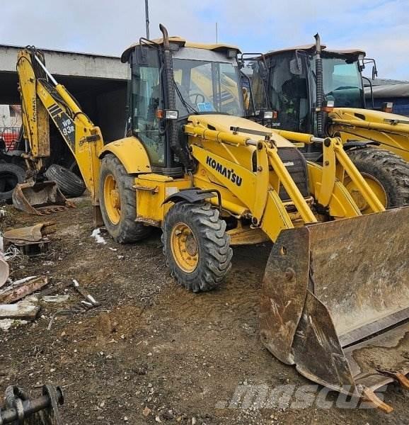 Komatsu WB 93 R Graaf-laadcombinaties