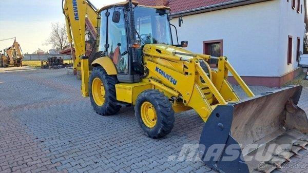 Komatsu WB 93 R Graaf-laadcombinaties