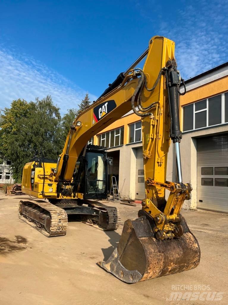 CAT 323 F LN Rupsgraafmachines