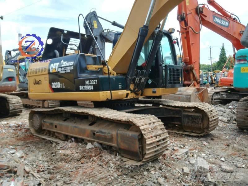 CAT 323 D L Rupsgraafmachines