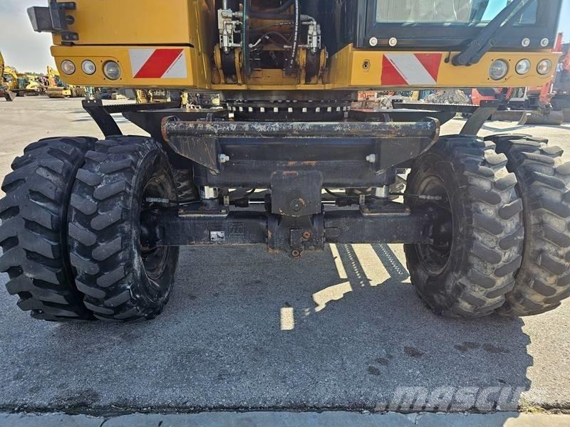 CAT M320F Wielgraafmachines