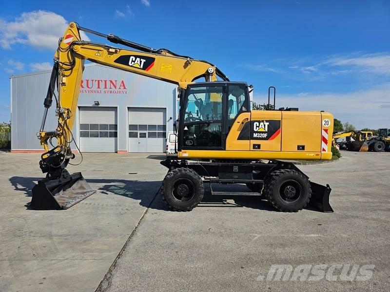 CAT M320F Wielgraafmachines