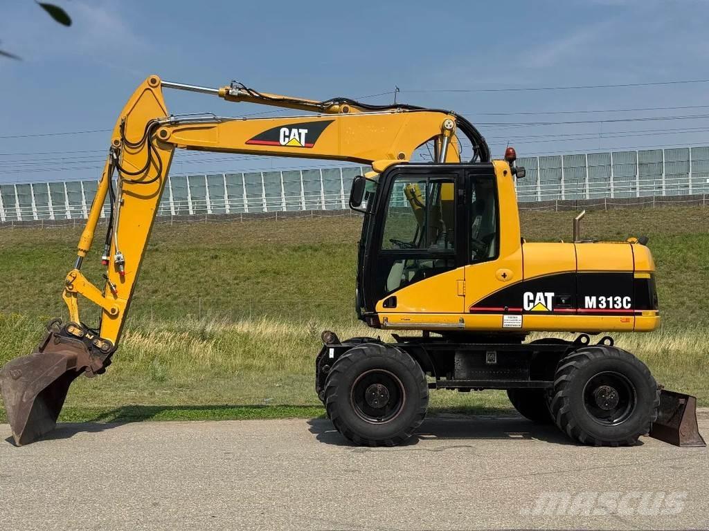 CAT M313C Wielgraafmachines
