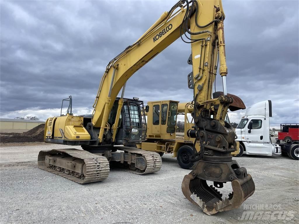 Kobelco SK210 LC-9 Boomstamladers