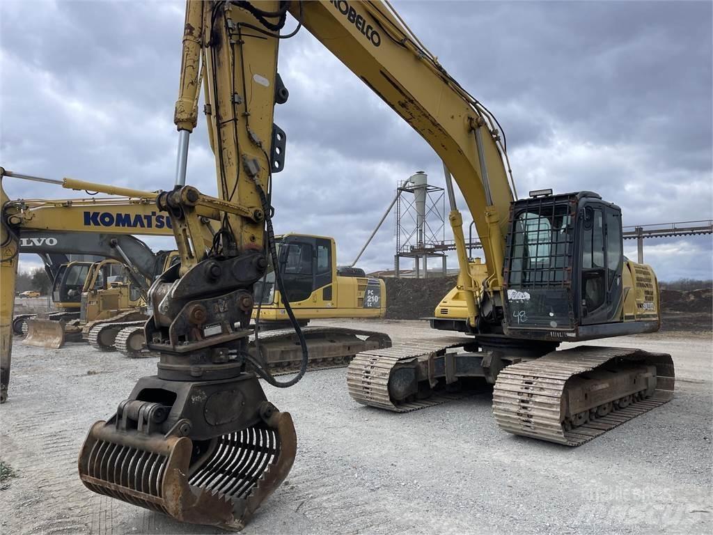 Kobelco SK210 LC-9 Boomstamladers