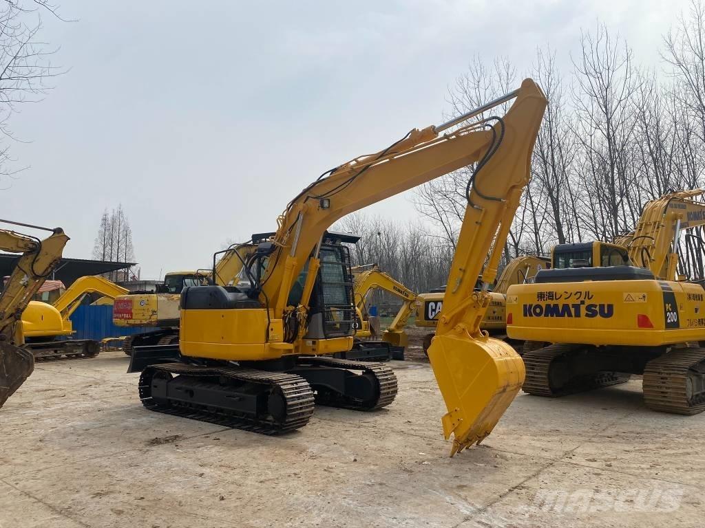 Komatsu PC128US Rupsgraafmachines