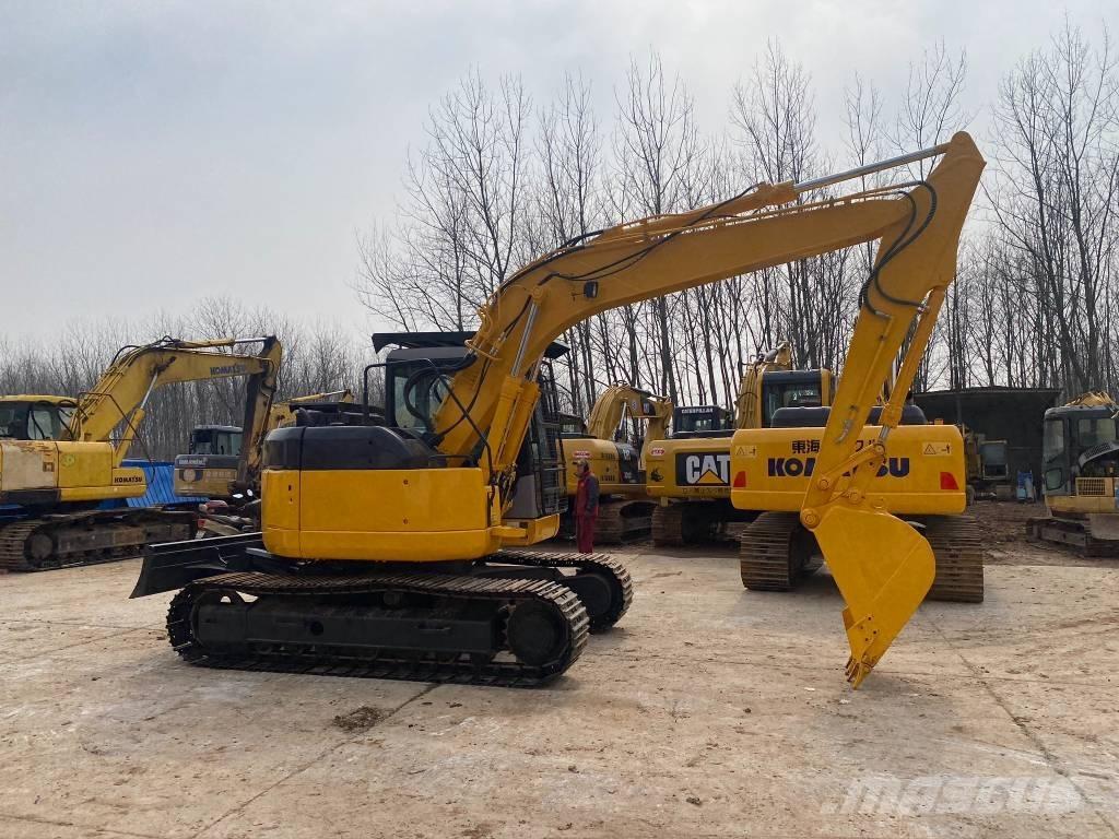 Komatsu PC128US Rupsgraafmachines