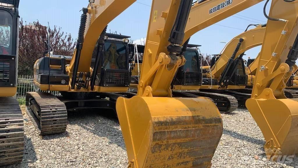 CAT 323 Rupsgraafmachines