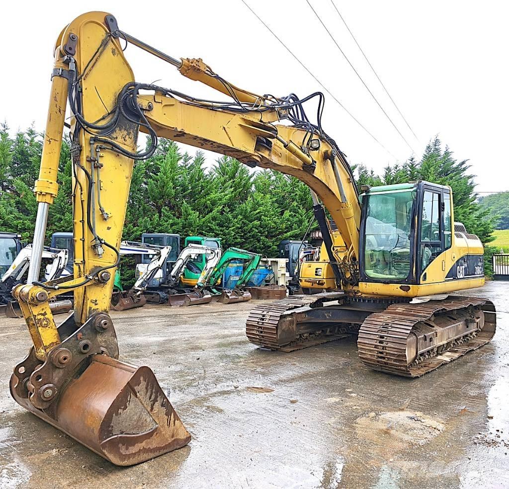 CAT 318 C Rupsgraafmachines