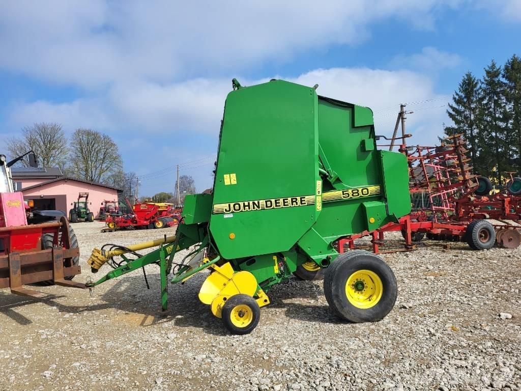 John Deere 580 Ronde-balenpersen