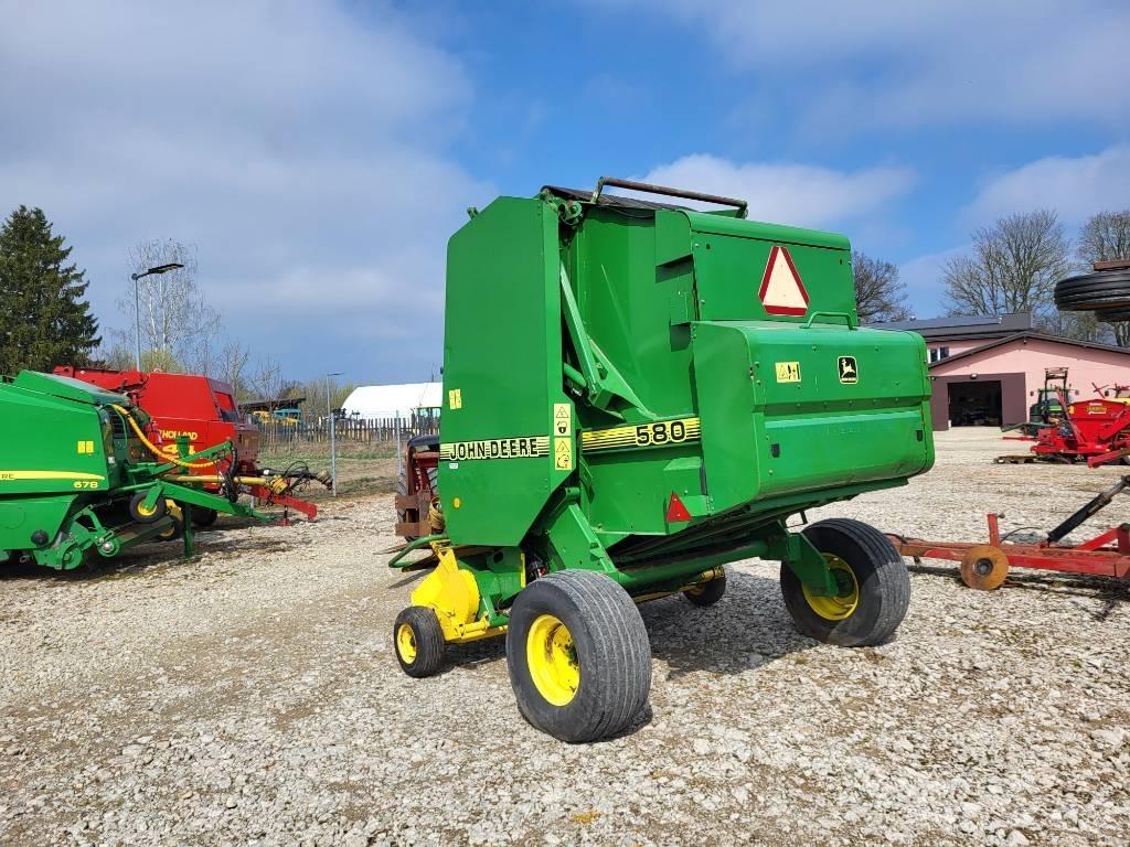 John Deere 580 Ronde-balenpersen