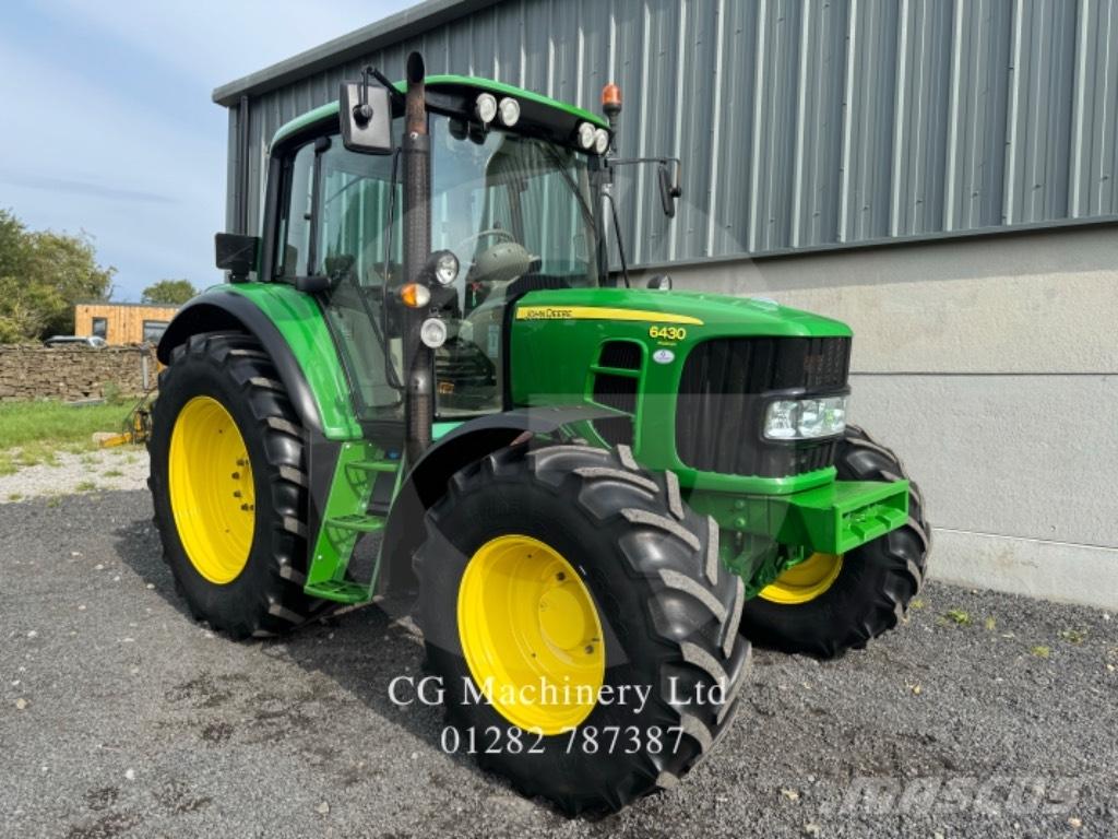 John Deere 6130 R Tractoren
