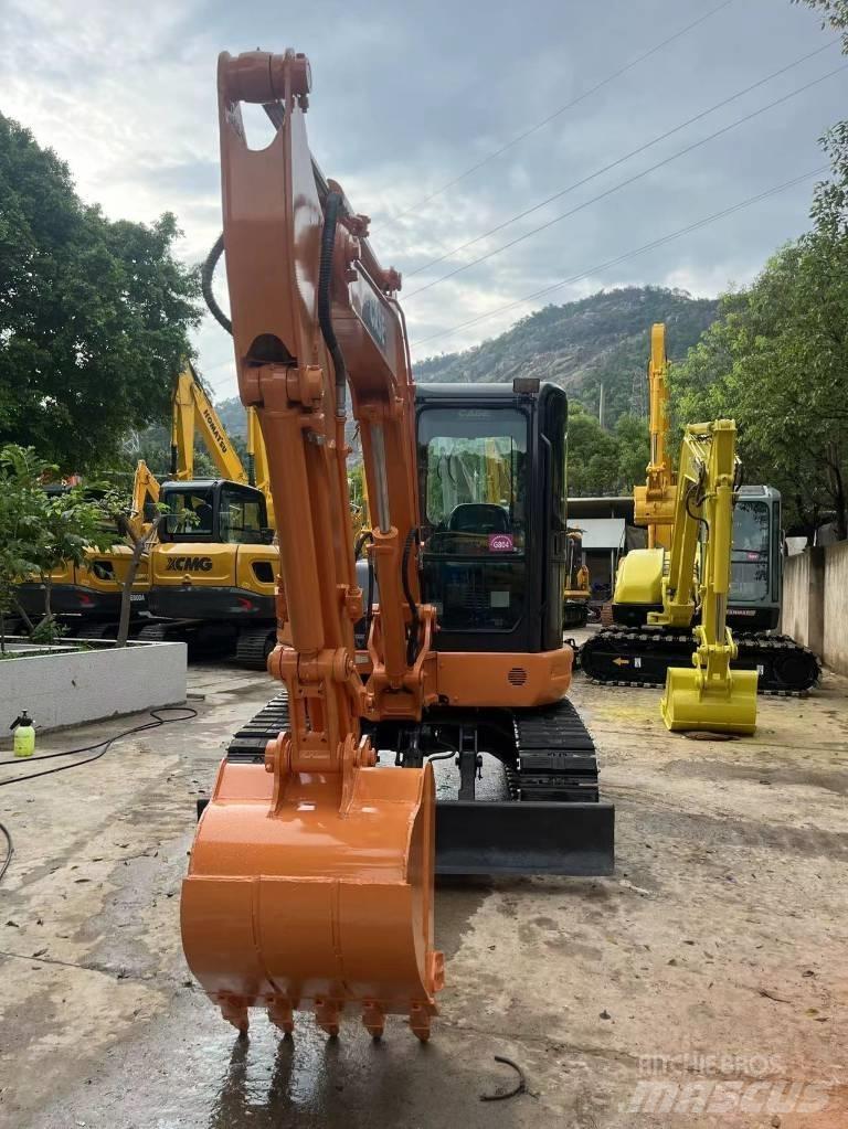 CASE CX 55 B Rupsgraafmachines