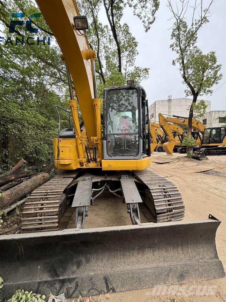 Komatsu PC 128 US Rupsgraafmachines