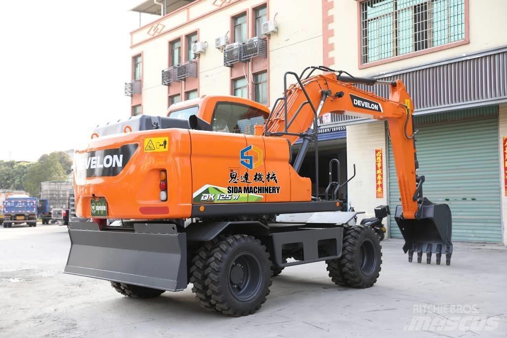 Develon DX125W Wielgraafmachines