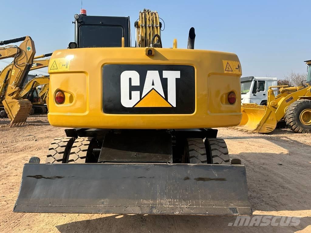 CAT M 320D Wielgraafmachines