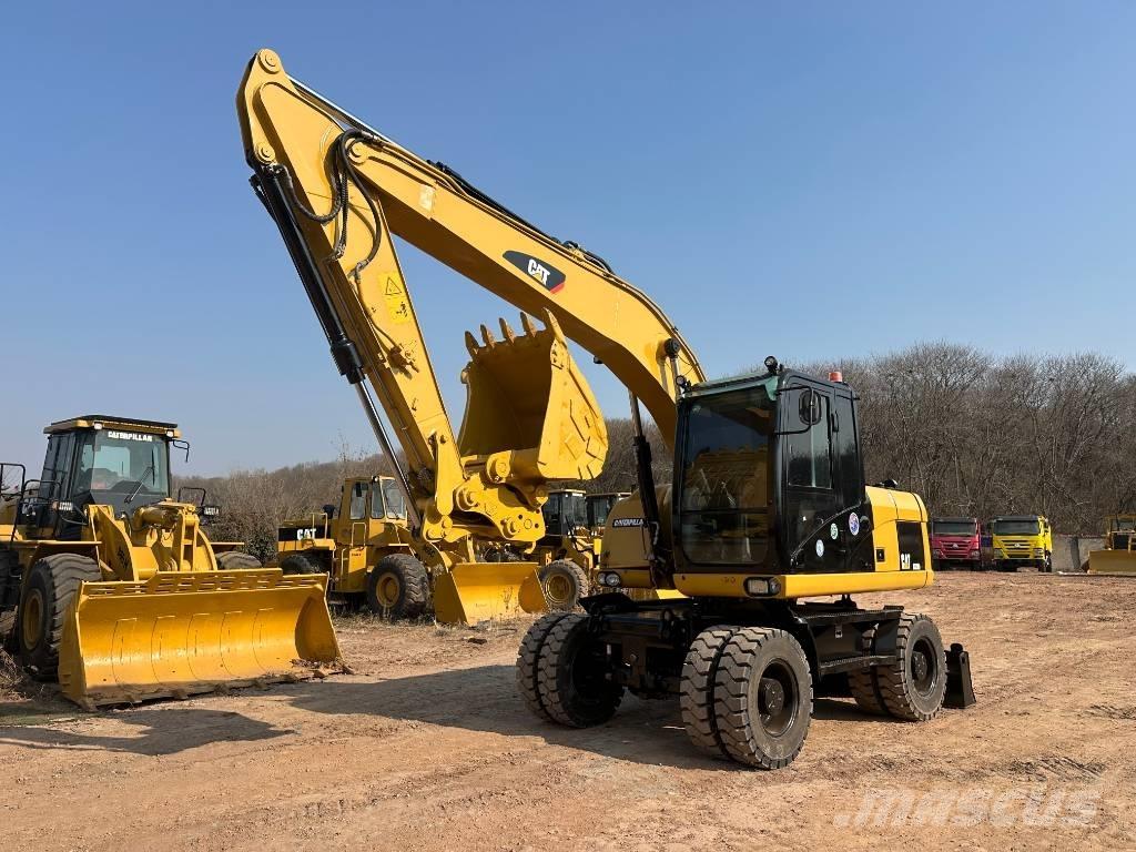 CAT M 320D Wielgraafmachines