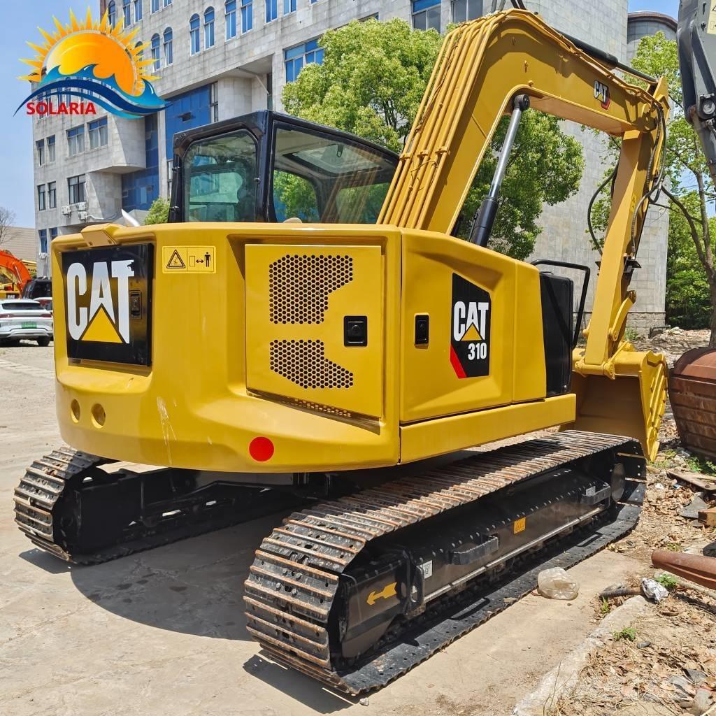 CAT 310 Rupsgraafmachines
