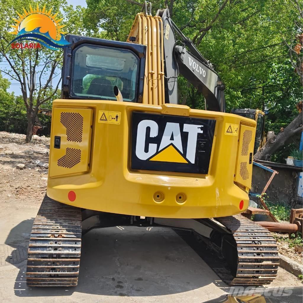 CAT 310 Rupsgraafmachines