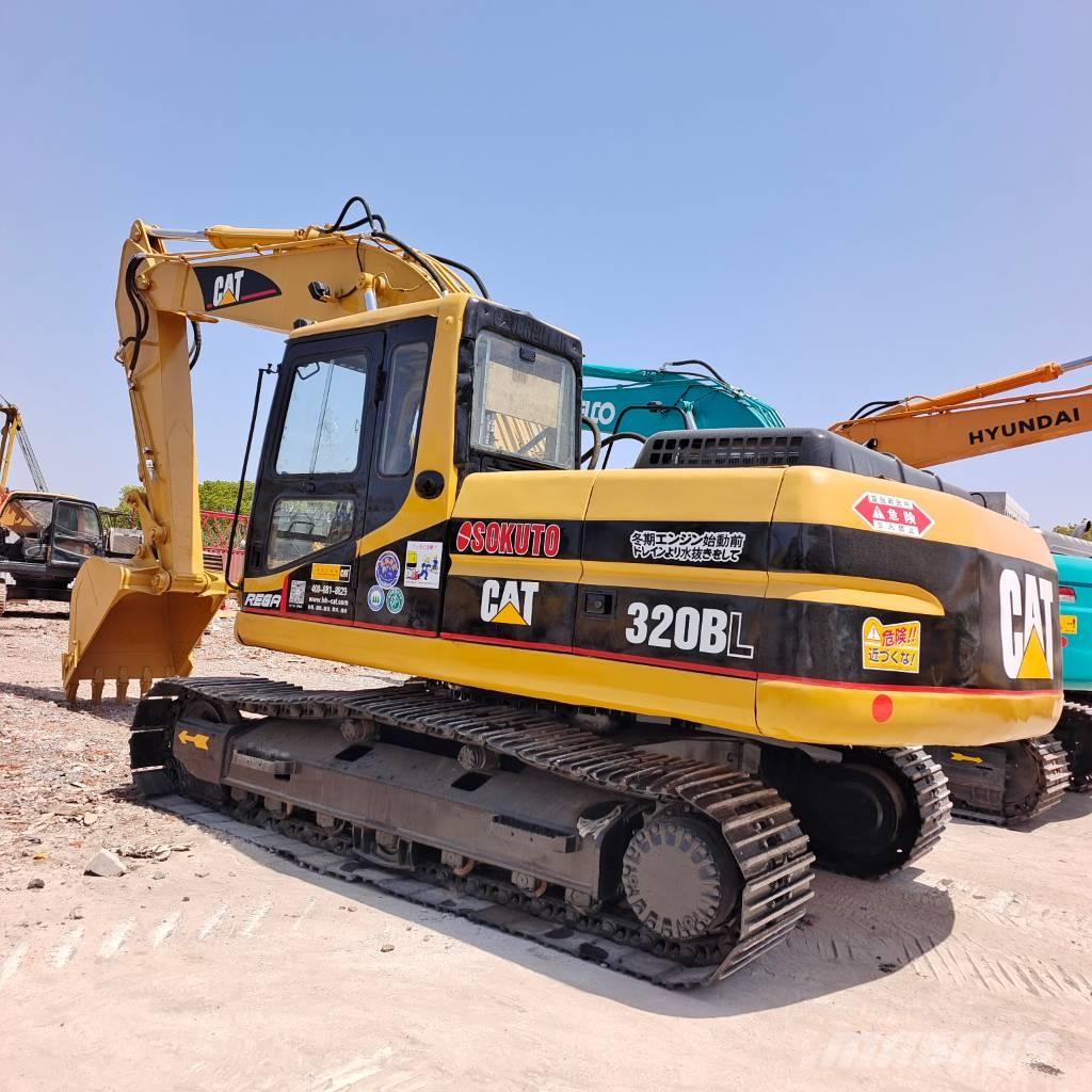 CAT 320 BL Rupsgraafmachines