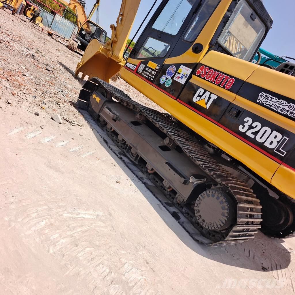 CAT 320 BL Rupsgraafmachines