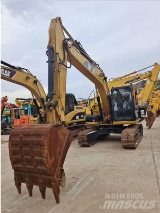 CAT 313 D Rupsgraafmachines