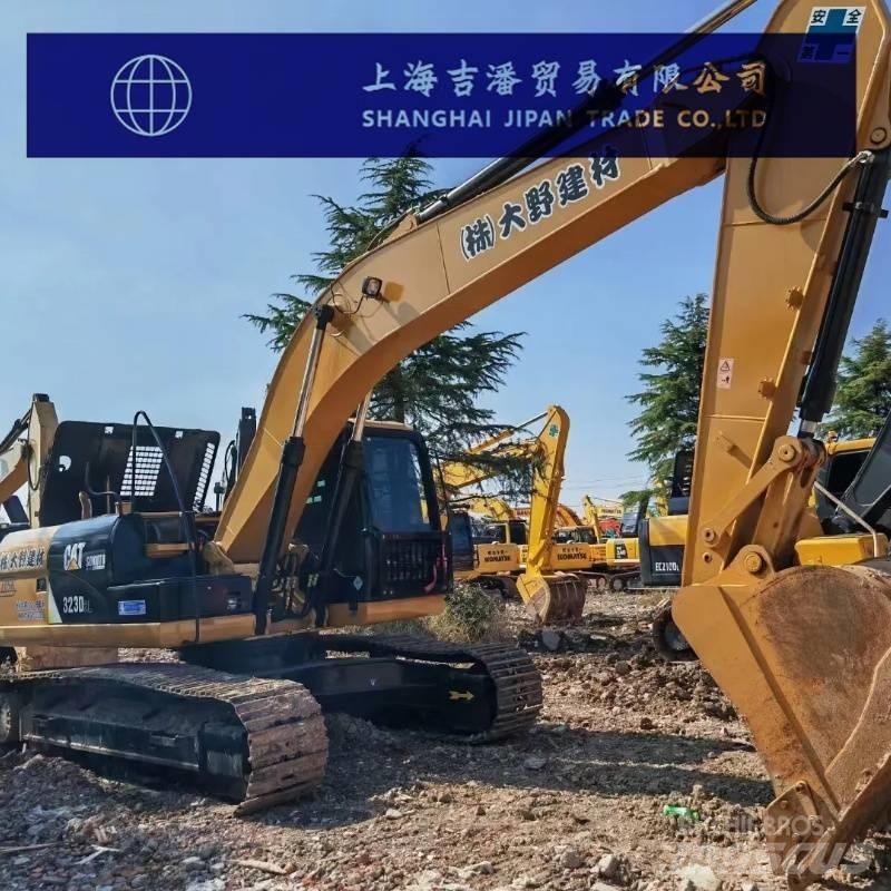 CAT 323 D Rupsgraafmachines