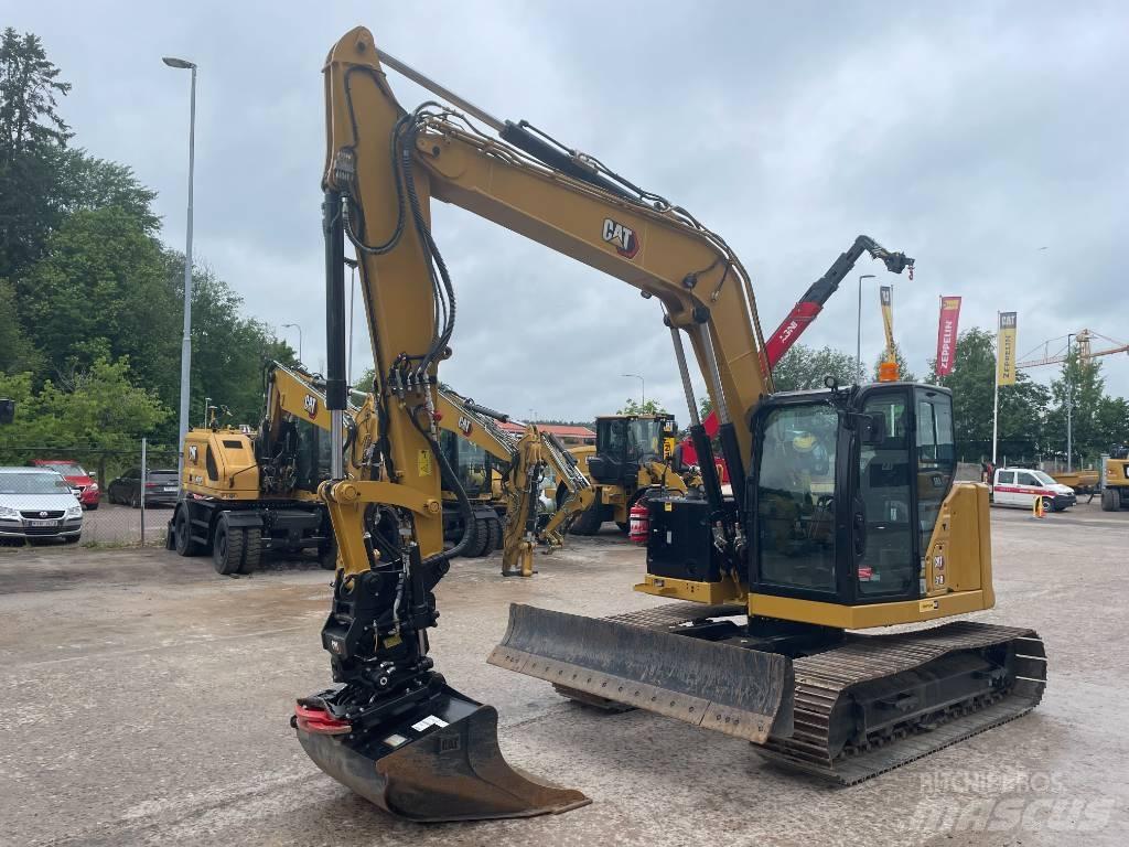 CAT 310 Rupsgraafmachines