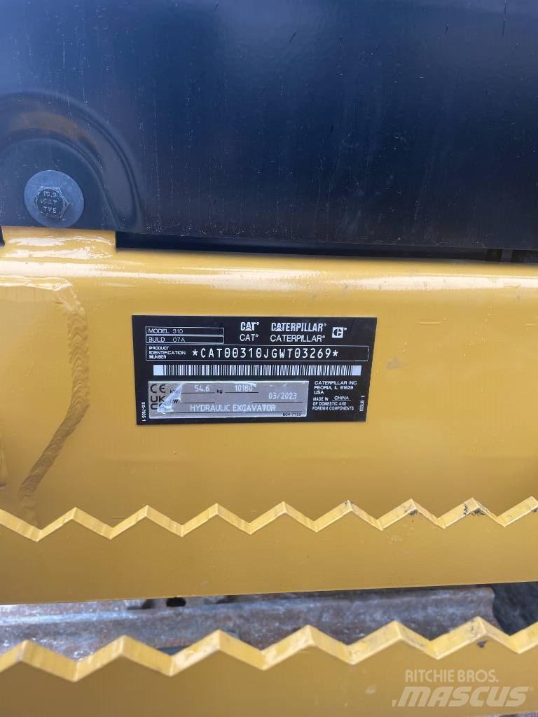 CAT 310 Rupsgraafmachines