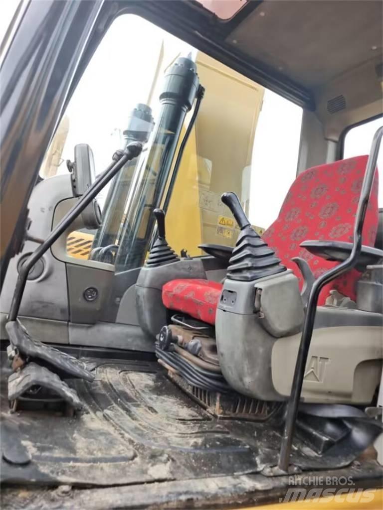 CAT 323 GC Rupsgraafmachines