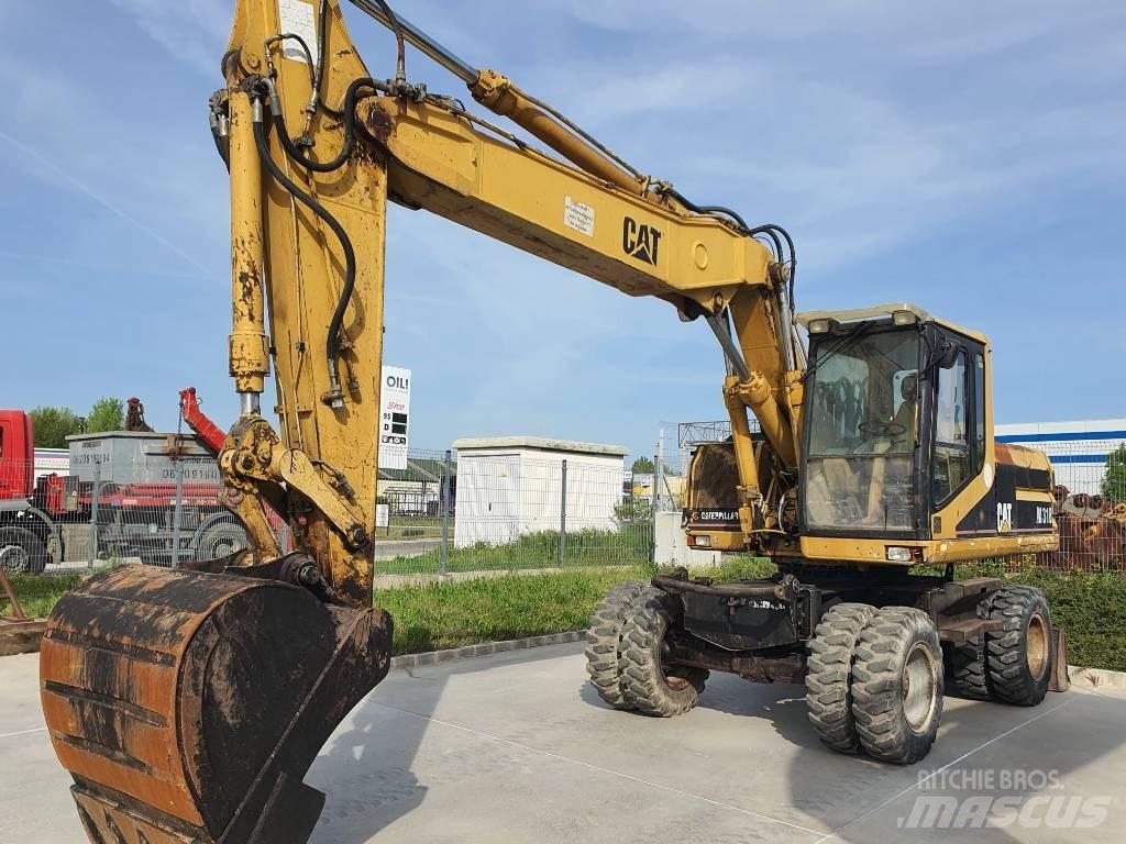 CAT M 318 Wielgraafmachines