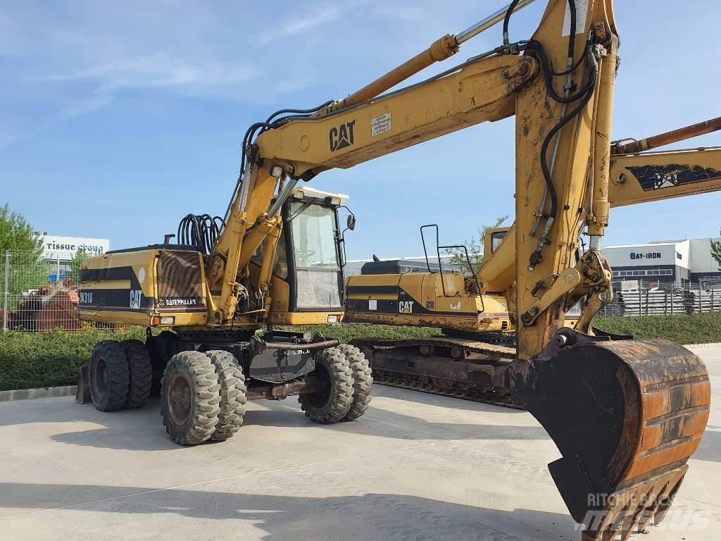 CAT M 318 Wielgraafmachines