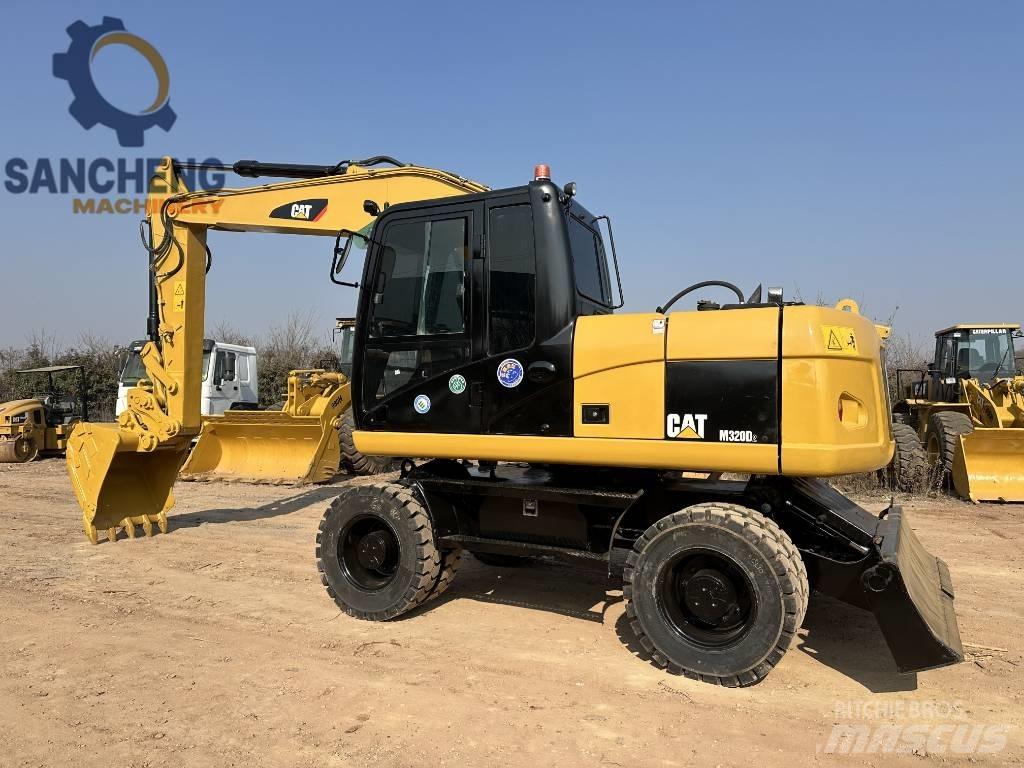 CAT M 320 D Wielgraafmachines