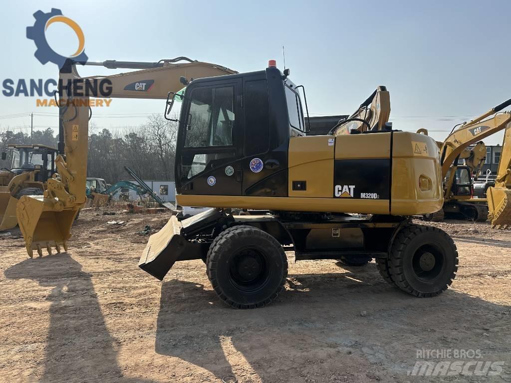 CAT M 320 D Wielgraafmachines