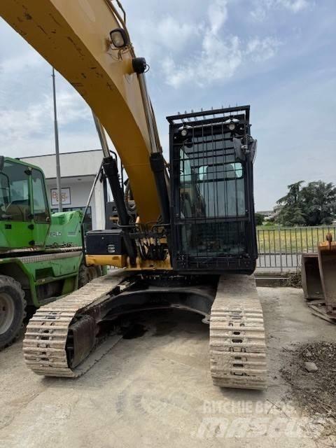 CAT 323 E Rupsgraafmachines