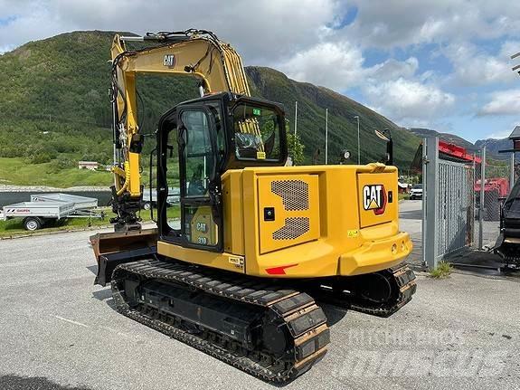 CAT 310 Rupsgraafmachines