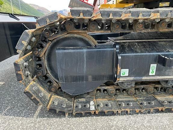 CAT 310 Rupsgraafmachines