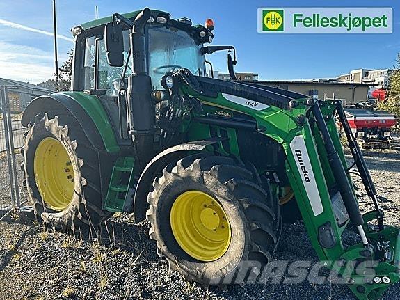 John Deere 6120M Tractoren