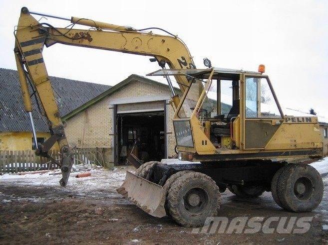 CAT 212 til ophug Rupsgraafmachines