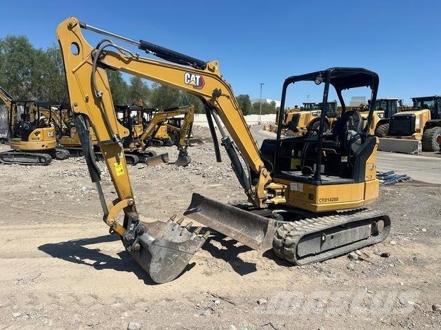 CAT 304 Rupsgraafmachines