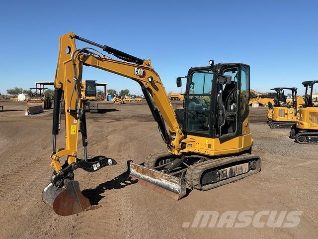 CAT 304 Rupsgraafmachines