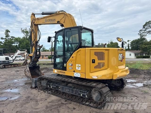 CAT 310 Rupsgraafmachines
