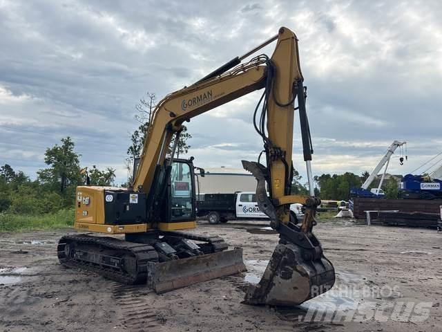 CAT 310 Rupsgraafmachines