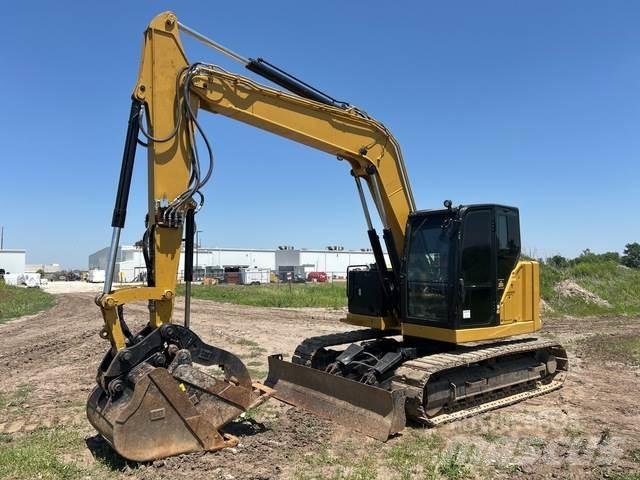 CAT 310 Rupsgraafmachines